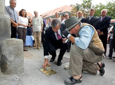 President of the Republic of Slovenia, Dr Danilo Türk, attended a ceremony on the unveiling of the 'Memorial Cobblestones', where he symbolically laid the last cobblestone commemorating Holocaust victims in Maribor (photo: Stanko Gruden/STA)