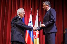 19. 12. 2022, Slovenske Konjice – Predsednik republike je Florjanu Jančiču vročil medaljo za zasluge za pomemben prispevek k slovenskemu prostovoljnemu gasilstvu in za ohranjanje ter varovanje gasilske dediščine (Nebojša Tejić/STA)